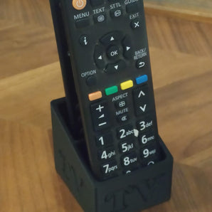 Praktický držák na dálkové ovladače televizoru