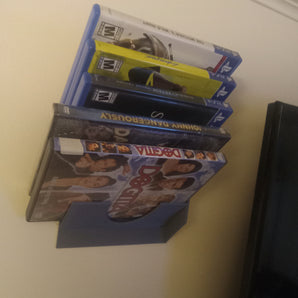 Nástěnná modulární police na DVD a hry