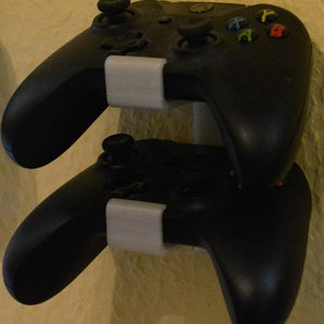 Nástěnný držák pro 2 ovladače Xbox One