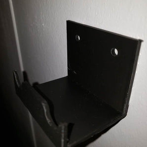 Nástěnný držák ovladače PS4 pro optimální skladování