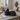 Roztomilá spící kočka v low-poly designu