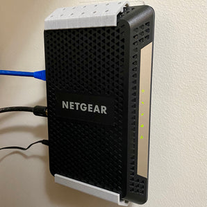Montáž na stěnu Netgear CM600 / CM1000 – Optimalizujte nastavení sítě