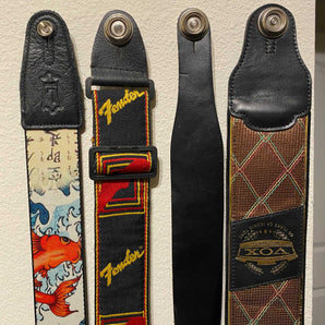 Držák na kytarový popruh a dokovací stanice Dunlop Strap Lock