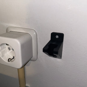 Nástěnný držák elektrického kabelu