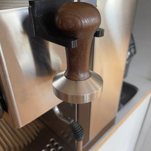 Držák na příslušenství Rancilio Silvia pro pěchovadlo