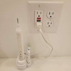 Držák Oral B na stěnu pro nabíječku zubního kartáčku s vedením kabelů